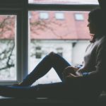 window-view-sitting-indoors-girl
