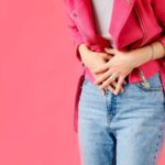stomach-ache-woman-holds-hands-stomach-menstrual-pain-or-bowel-problems