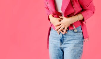stomach-ache-woman-holds-hands-stomach-menstrual-pain-or-bowel-problems