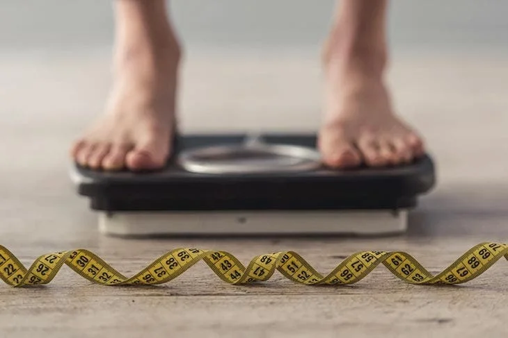 Measuring your weight on a scale