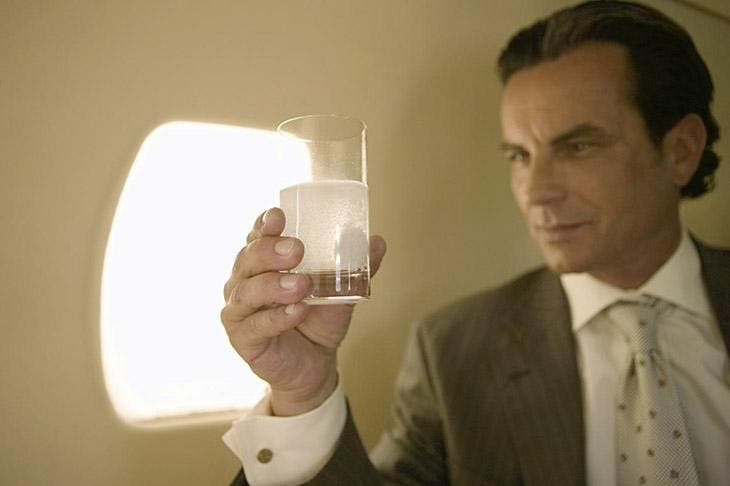 Drinking medicine on the plane