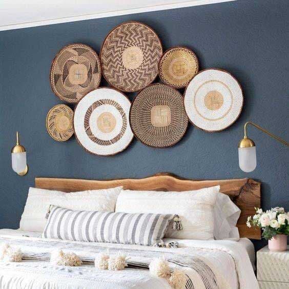 Wicker discs above the bed