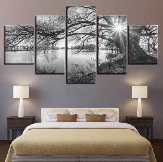 Paintings hanging above the bed