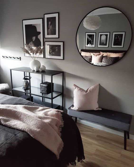 Black and white paintings hanging in the room