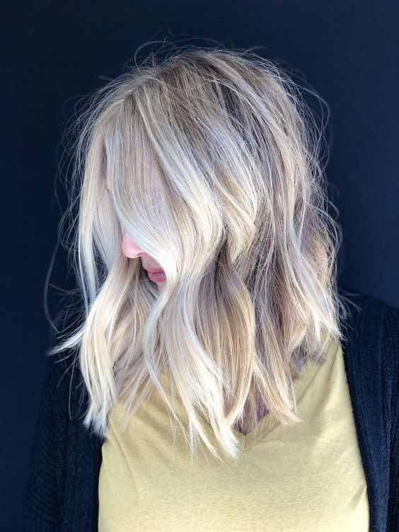 Wavy Shoulder-Length Hair in Polar Blonde